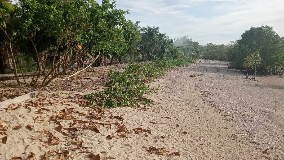 Titled beach lot for sale