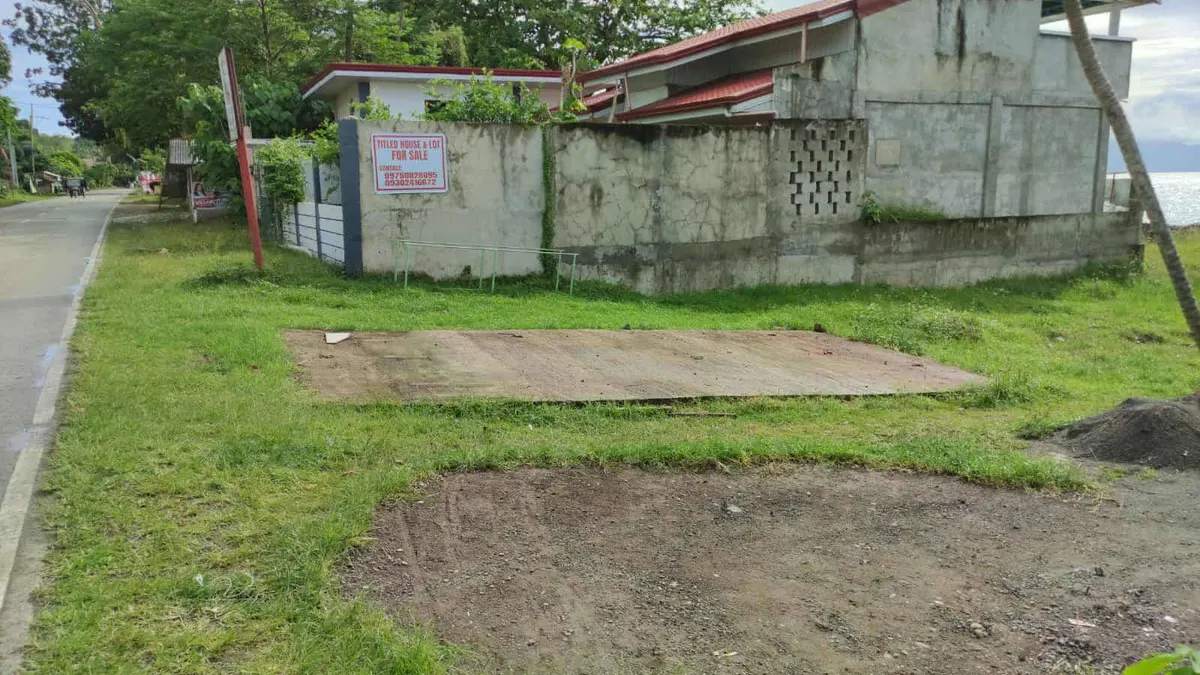 National Road Commercial Lot in Padre Burgos