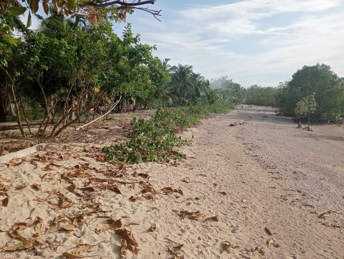 Titled beach lot for sale